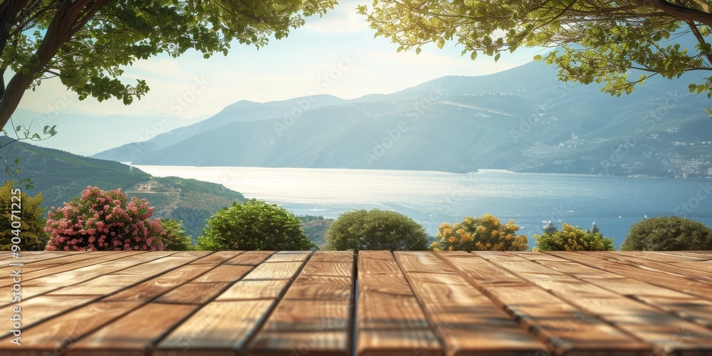 Poster an empty wood table on a patio, overlooking a scenic view of mountains or the ocean