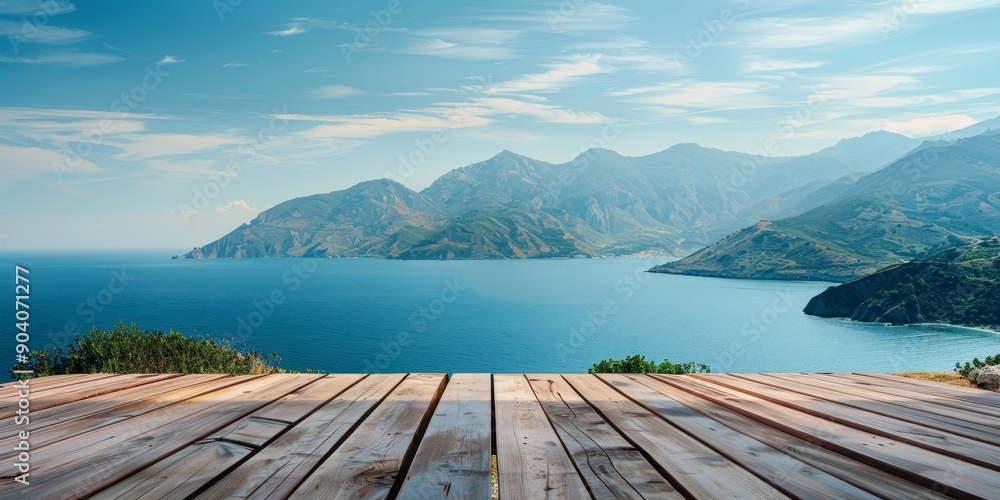 Poster an empty wood table on a patio, overlooking a scenic view of mountains or the ocean