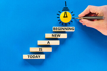 Today is a new beginning symbol. Concept words Today is a new beginning on wooden blocks. Beautiful...