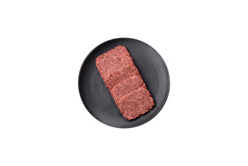 Delicious canned pink ham with salt, spices and herbs