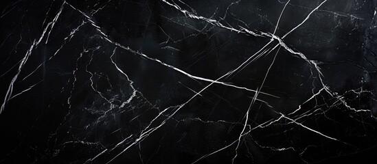 Luxurious black marble wall texture with abstract white cracks suitable for adding text or images copy space image