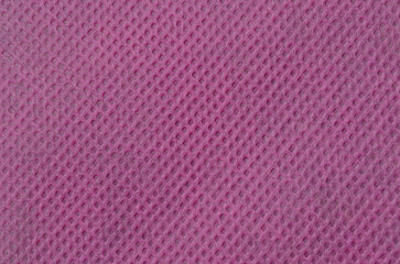 surface texture background of the purple non-woven fabric is rough and porous