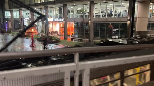 train in the urban city and skyscraper behind night life