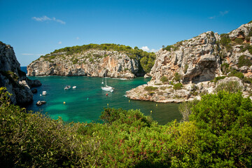 prehistoric cliff dwellings, Cales Coves bay, Cami de Cavalls, GR223, Minorca, Balearic Islands,...