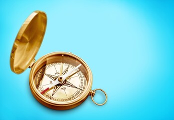Vintage golden compass on desk background
