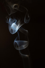 The artwork created from smoke is beautiful and gentle. Taken with a camera that has a high magnification rate.