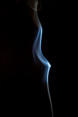 The artwork created from smoke is beautiful and gentle. Taken with a camera that has a high magnification rate.