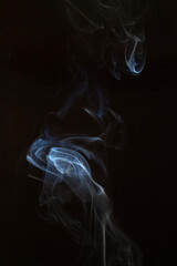 The artwork created from smoke is beautiful and gentle. Taken with a camera that has a high magnification rate.