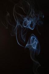 The artwork created from smoke is beautiful and gentle. Taken with a camera that has a high magnification rate.