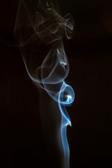 The artwork created from smoke is beautiful and gentle. Taken with a camera that has a high magnification rate.