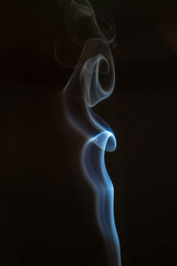 The artwork created from smoke is beautiful and gentle. Taken with a camera that has a high magnification rate.