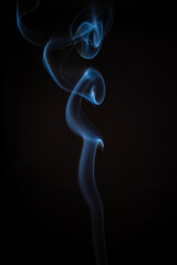 The artwork created from smoke is beautiful and gentle. Taken with a camera that has a high magnification rate.