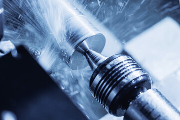 CNC turning production of shafts for cars factory. Concept machine for cut metal industry, blue...