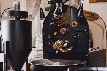 Closeup coffee roasting machine, small food industry