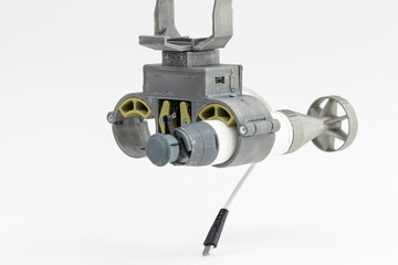 Controlled grenade release mechanism for drone for army on white isolated background. Concept UAVs using in war