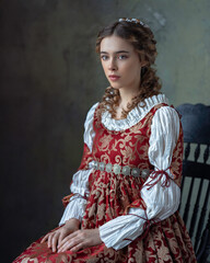 Portrait of an aristocratic girl in a vintage Renaissance dress