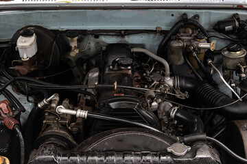 Close-up old diesel engine with detail of cylinder engine for modern repair.