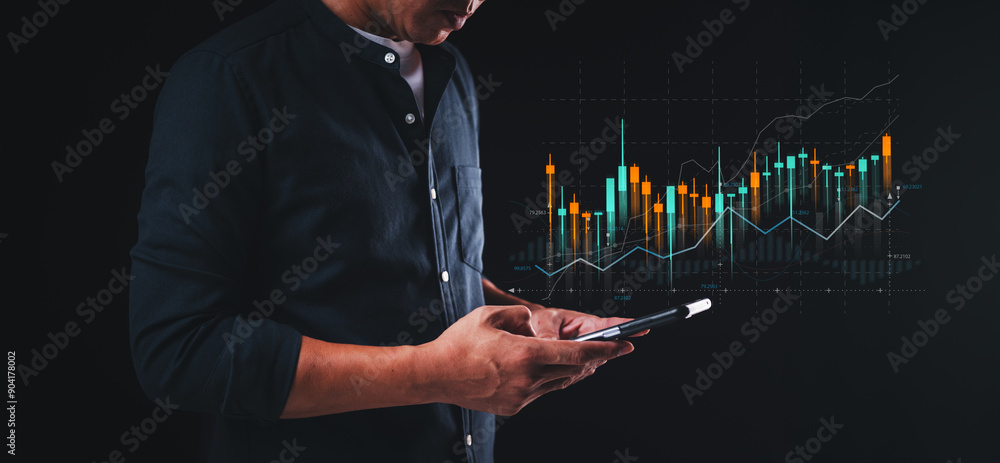 Poster businessman holding a phone displaying virtual technical graphs and charts, used for analyzing the s