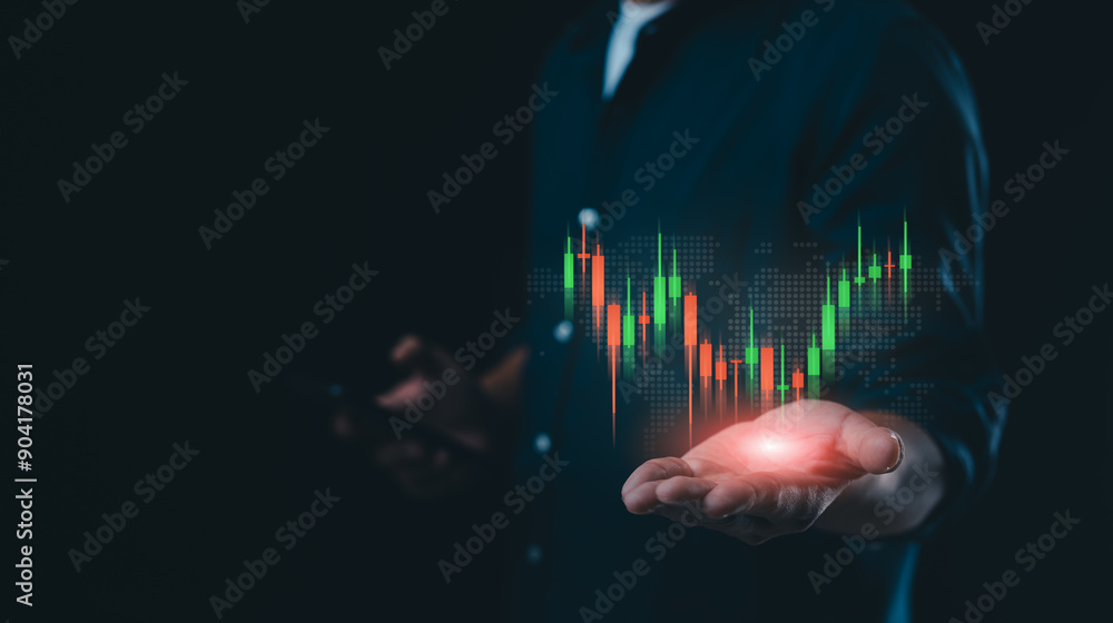 Poster businessman holding displaying virtual technical graphs and charts, used for analyzing the stock mar