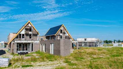 Modern Dutch Suburban Development Under Construction in Sunny Skies