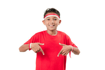 Indonesian independence day theme. Indonesian boy in red shirt with red and white headband isolated on white background