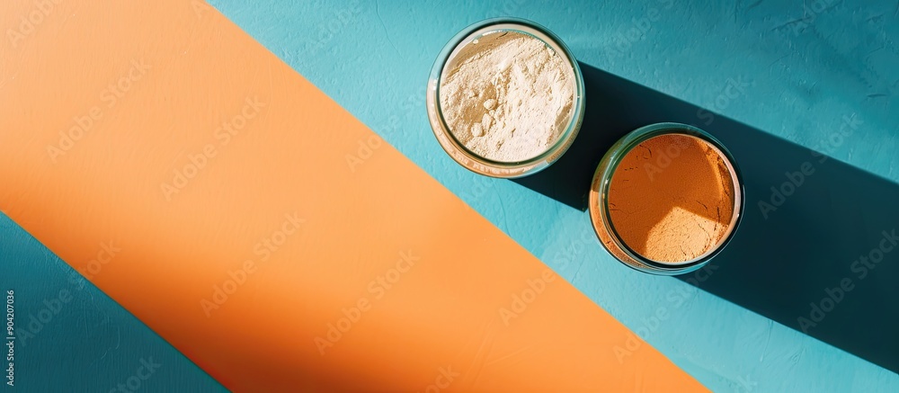 Poster top view of jars with protein powder on a colored background creating a concept for sports nutrition
