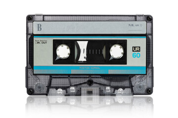 Vintage audio cassette tape isolated on white reflecting
