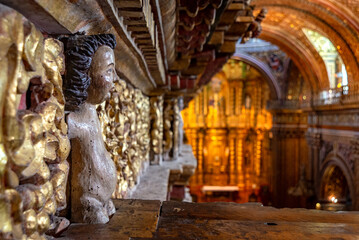 Quito, Pichincha, Ecuador: November 30, 2013: Interiors of the San Francisco church, with its many details, statues and decorations.
