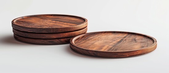 Obraz premium Wooden photo props trays coasters on plain white background for copy space image