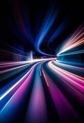 A blurred night cityscape with colorful light trails, a high-speed motion or movement