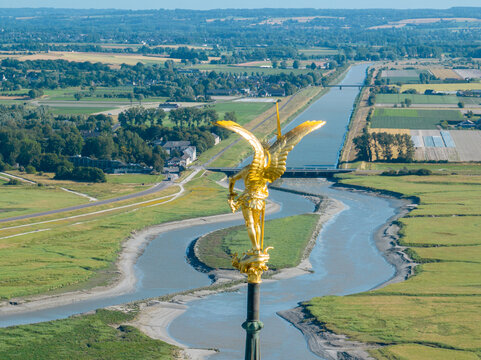 Aerial view of the Statue of Saint Michel and the dragon, Spire of Mont Saint Michel Abbey, Normandy. France