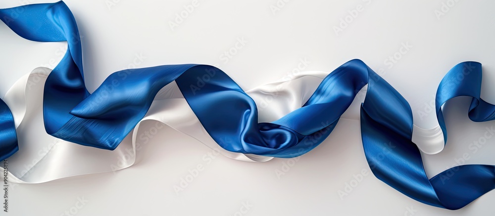 Poster top view of a blue satin ribbon on a white background with ample copy space image available