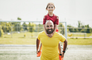 soccer, sport with a dad and daughter training on a court outside for leisure fitness and fun