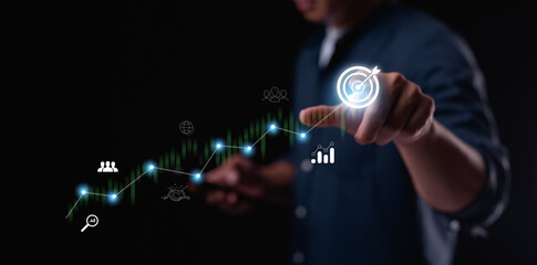 Business startup and investment goals are illustrated by a businessman touching a growing business graph. This represents planning and initiating a corporate startup.