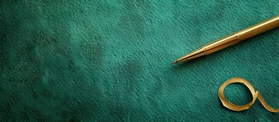 A golden rule symbol on paper with a green backdrop including a copy space image