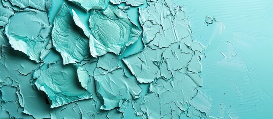 Obraz premium Close up shot of dense turquoise cardboard with a textured old light cyan paper background perfect as a backdrop for adding elements with copy space image