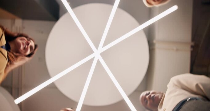 Employees, people and fist bump from below at office for team building and collaboration with smile. Business, support and happy with unity for solidarity, teamwork and partnership in circle