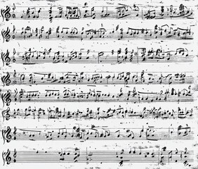Old sheet music texture background in black and white