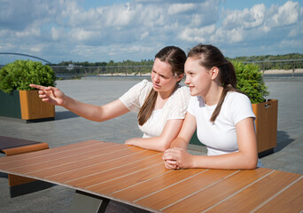 Girls look at people with disapproval