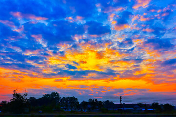 The beautiful natural sunset in the evening, along the railway in Lamphun Province, northern Thailand, Southeast Asia.