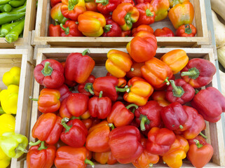 choosing pepper at the grocery store
