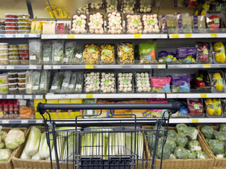 greens and various vegetables at the grocery store