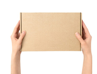 female hands holding cardboard box on white isolated background, top view