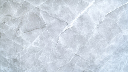 Obraz premium Top view of a polished white soapstone background with smooth texture and light grey swirls, perfect for background 