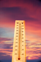 Thermometer shows high temperature in summer heat