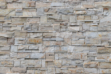 Stone texture background with varied pastel tones, creating a soft and elegant design