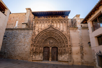Gothic facade of the church of Santa Mar&iacute;a de Requena, Valencia, Spain with midday light