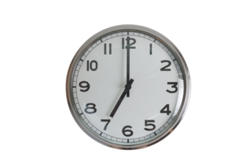 A white round shape wall clock with black hands showing the time of 7 o'clock cutout from background. Short hand at 7 o'clock and long hand at number 12.