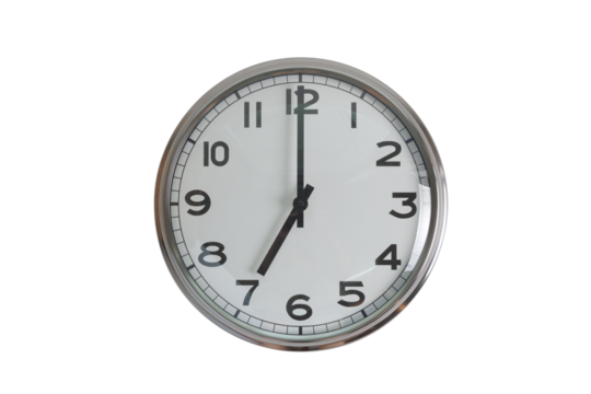 A white round shape wall clock with black hands showing the time of 7 o'clock cutout from background. Short hand at 7 o'clock and long hand at number 12.