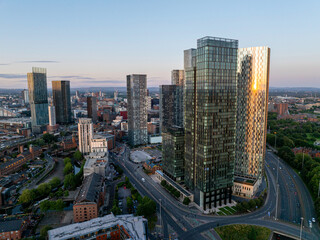 Aerial view of modern skyscrapers in Manchester at dusk